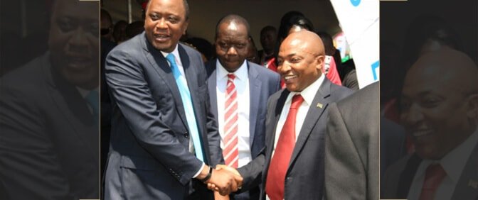 The President of the Republic of Kenya Uhuru Kenyatta with Richard Muteti HSC